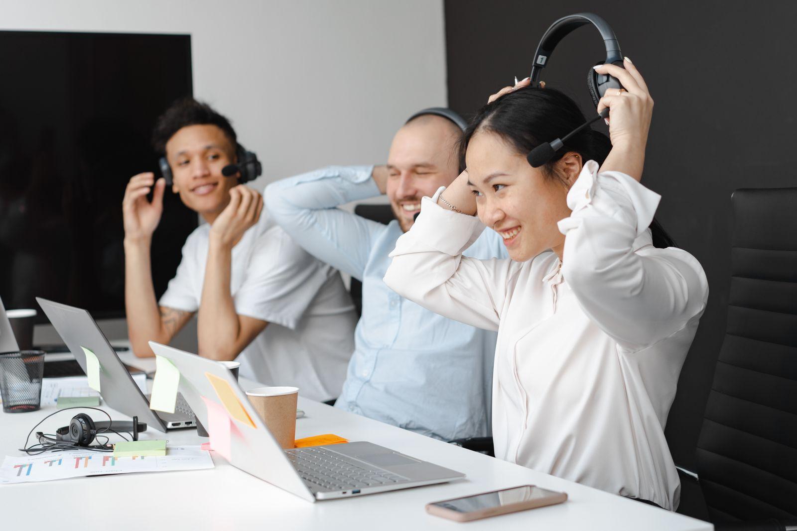 Taika interpreters at work — a diverse team with headsets handling live sessions